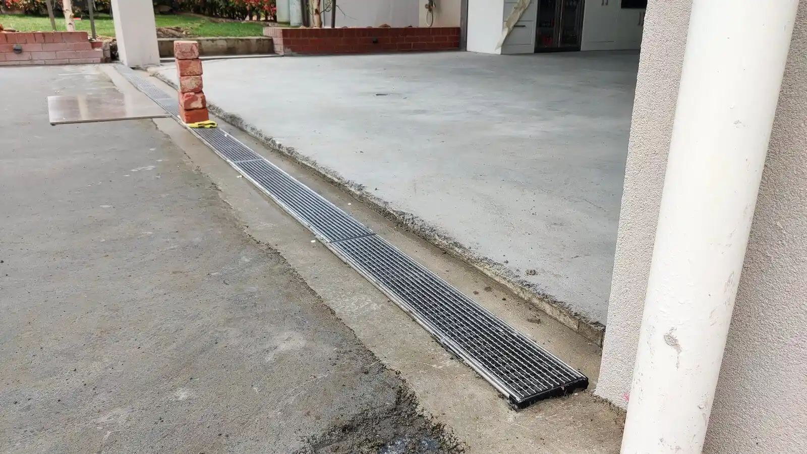 Drainage That Protects Concrete and Hardscapes